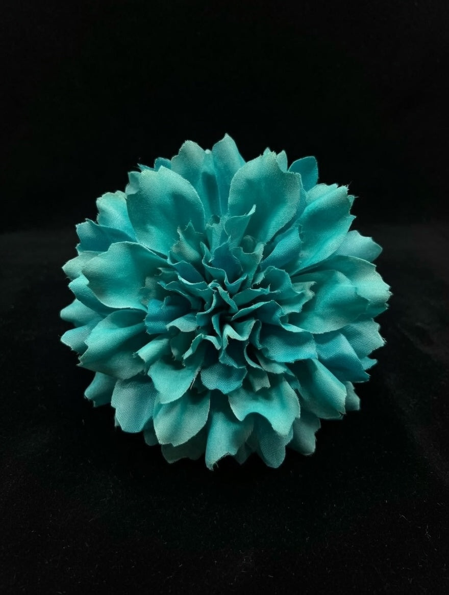 Flor turquesa suave y luminoso