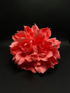 Flor coral intenso y luminoso